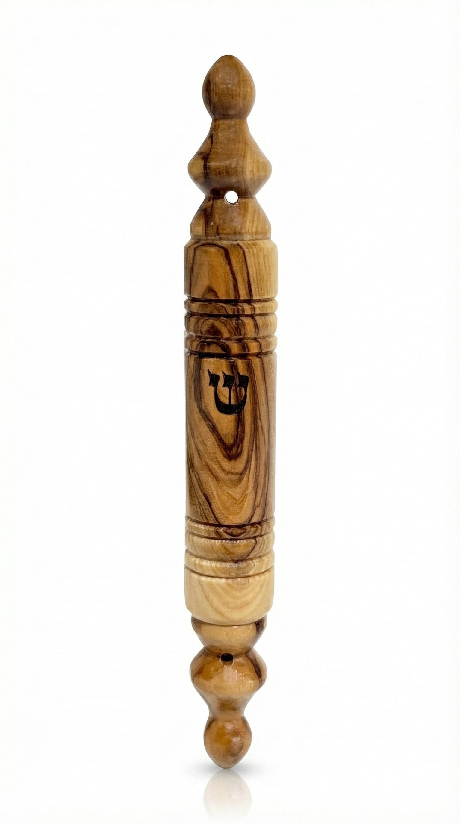 Natural olive wood Mezuzah with Hebrew inscriptions, mounted on a white background with subtle reflection, detailed wood grain visible.