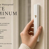 Large Modern Waterproof white Aluminum Outdoor Mezuzah and its silver Shin beside a contemporary front-door setting
