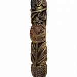 Elevated image of a brass Leafs Mezuzah with detailed engravings, Hebrew lettering, and a polished finish, mounted on a white studio backdrop.