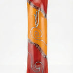 Elegant glass mezuzah, 5 1/4 inches tall, with detailed Hebrew engravings, polished surface, displayed on a bright white studio background with soft reflection.