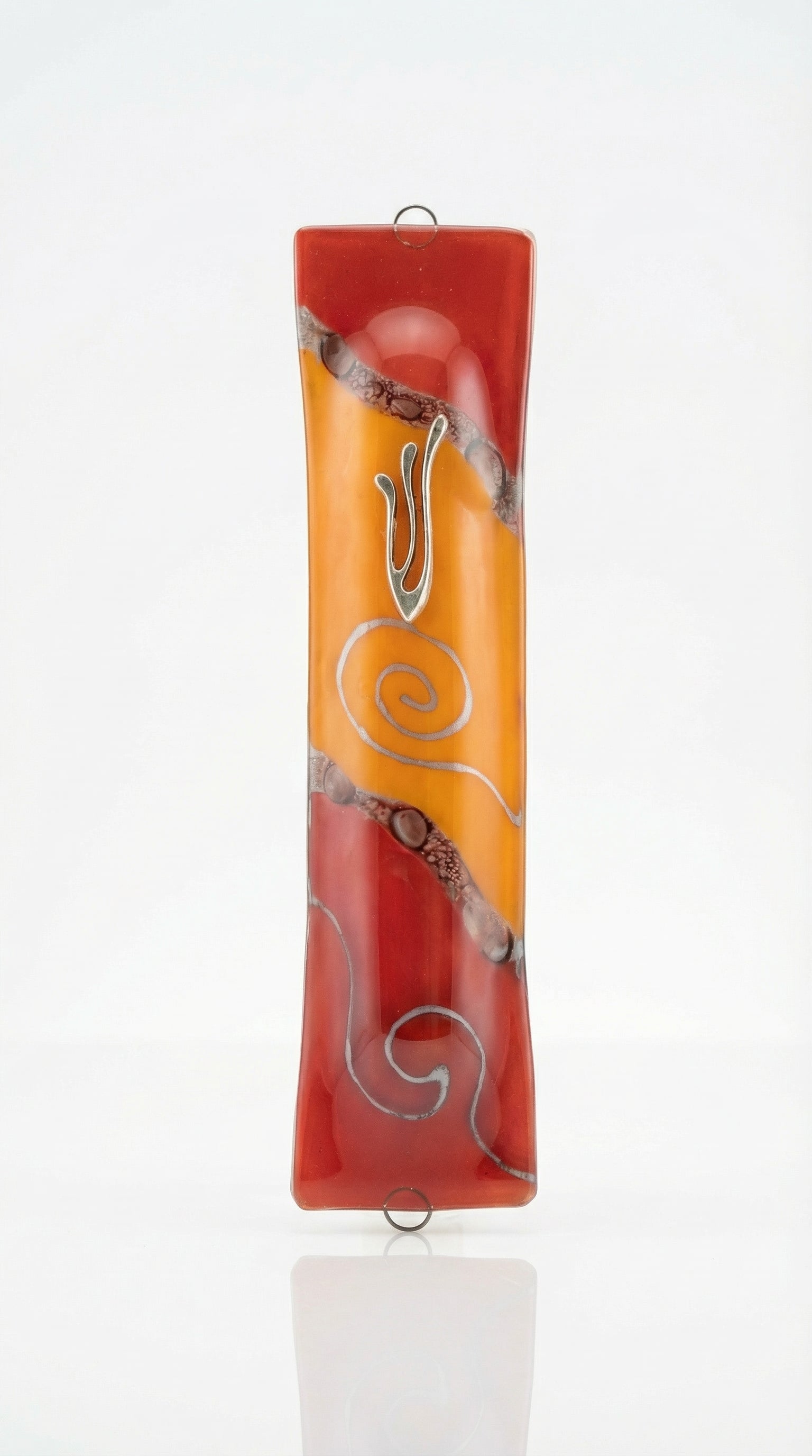 Elegant glass mezuzah, 5 1/4 inches tall, with detailed Hebrew engravings, polished surface, displayed on a bright white studio background with soft reflection.