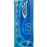 Elegant light blue glass mezuzah measuring 4.5 inches tall with engraved Hebrew letters and decorative motifs, mounted on a white background with subtle reflection.