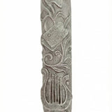 Elegant Lily Mezuzah crafted of pewter with hand-painted enamel detailing, measuring 4 inches tall, suitable for doorways, with a subtle reflection on white background.
