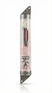 Pink ballerina mezuzah made of pewter with enamel, detailed engraving, on a white studio background with subtle reflection.
