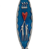 Upscale product image of a detailed pewter and enamel Love Mezuzah, 4 inches long, with precise textures and Hebrew engravings, on a pure white background.