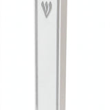 Angled view of the Lumen Silver-Framed White Acrylic Mezuzah, a modern waterproof white mezuzah case from Israel with a narrow silver frame and silver Shin, holding a kosher mezuzah scroll up to 5 inches