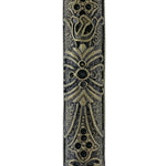 Upscale Levi Mezuzah made of brass, 4 inches tall, with detailed engraved Hebrew lettering and decorative motifs, placed on a white studio background with soft reflection.