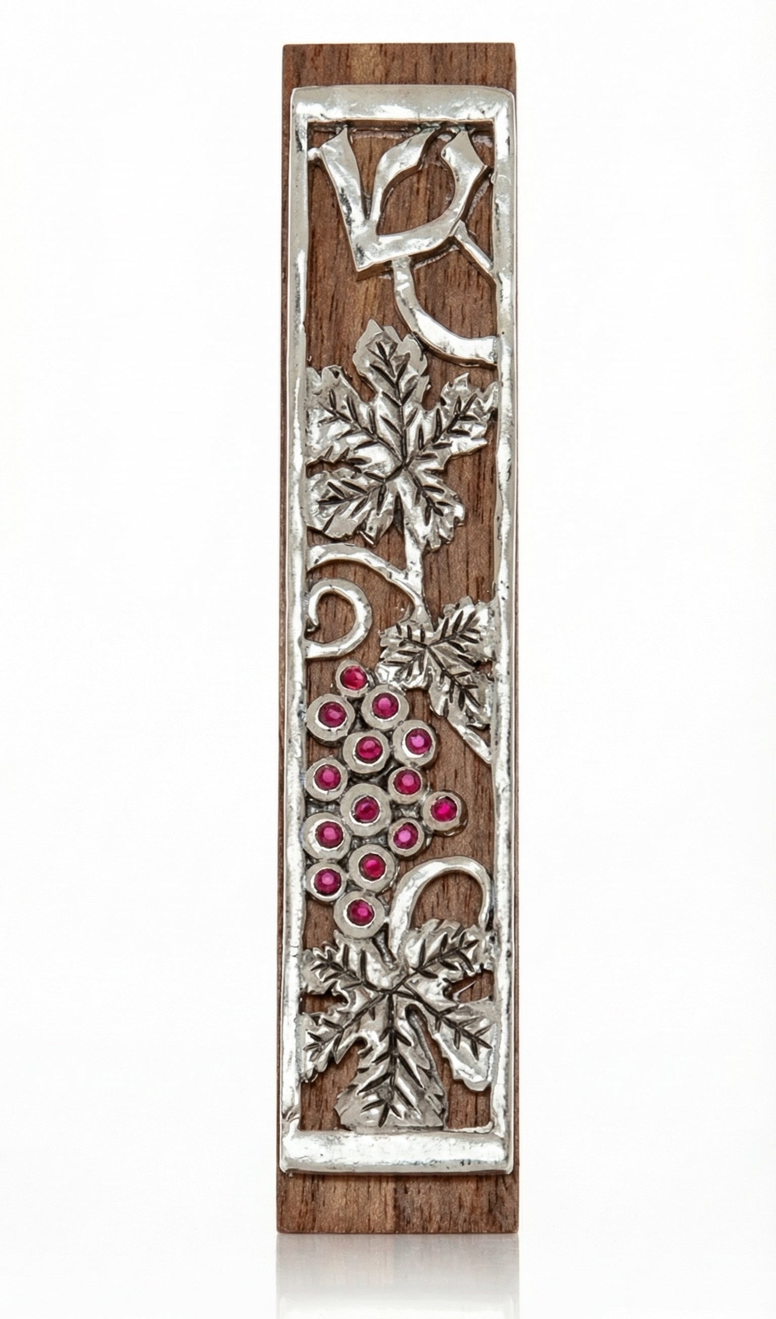 Mahogany Mezuzah with curling pewter vine and maroon stones depicting the holy land, shown on a white background with soft reflection.