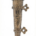 Solid brass medieval mezuzah with bird motif and yellow crystal on a white studio background, showcasing fine craftsmanship and detailed design.