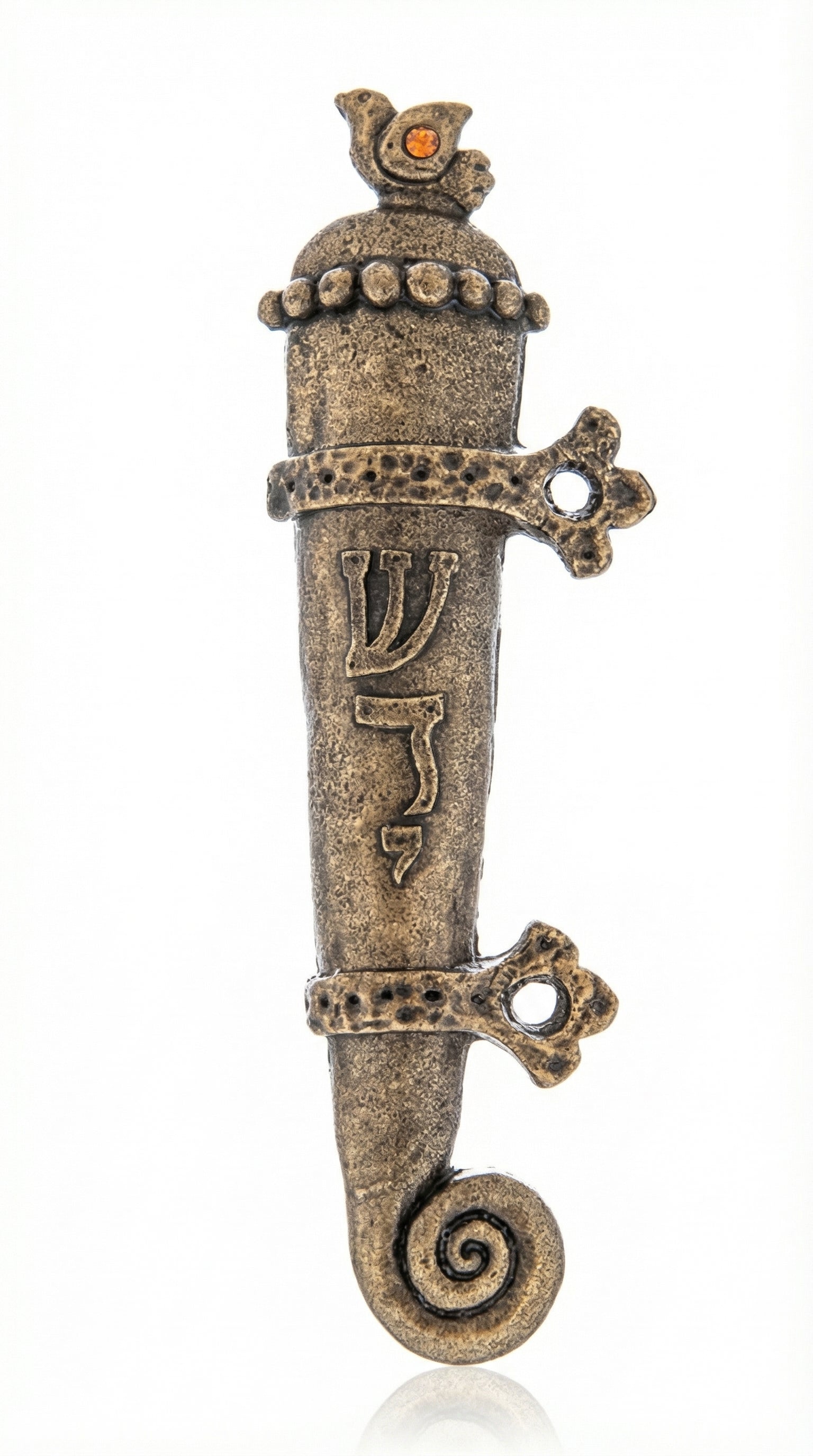Solid brass medieval mezuzah with bird motif and yellow crystal on a white studio background, showcasing fine craftsmanship and detailed design.