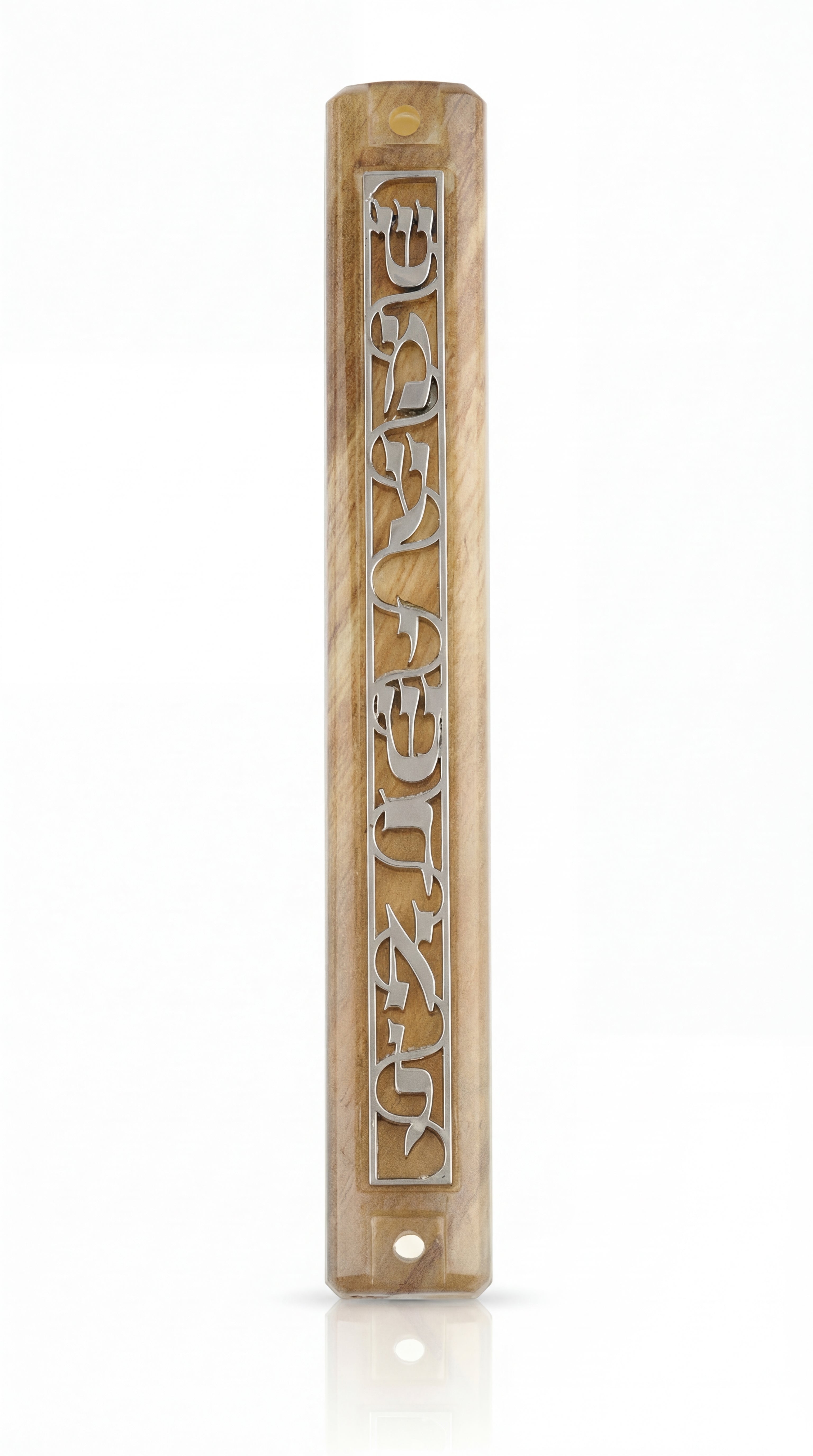 Close-up of acrylic Shema Mezuzah on white background with reflection, highlighting intricate details and craftsmanship.