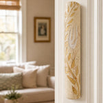 Realistic indoor scene with Jerusalem stone mezuzah mounted vertically on a doorpost at entry, demonstrating authentic materials and placement.
