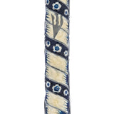 Blue pewter and enamel mezuzah with Hebrew engraved details and decorative motifs, displayed on a white background with soft reflection.