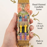 Person holding the decorative Golden Shabbat Candlelight Mezuzah, showcasing its detailed design and texture.