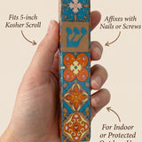 Person holding a ceramic Mezuzah showcasing size, material, and mounting details in a clean, minimalist layout.