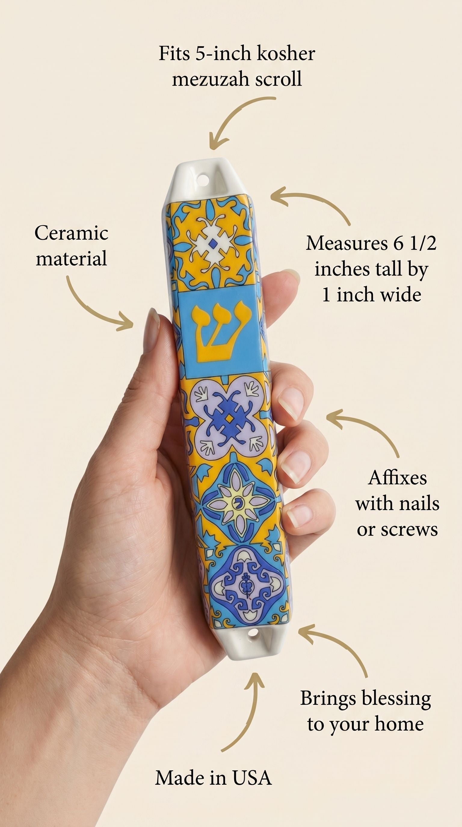 Person holding a ceramic Portugal mezuzah, showcasing the product's size and design details with a clean background.