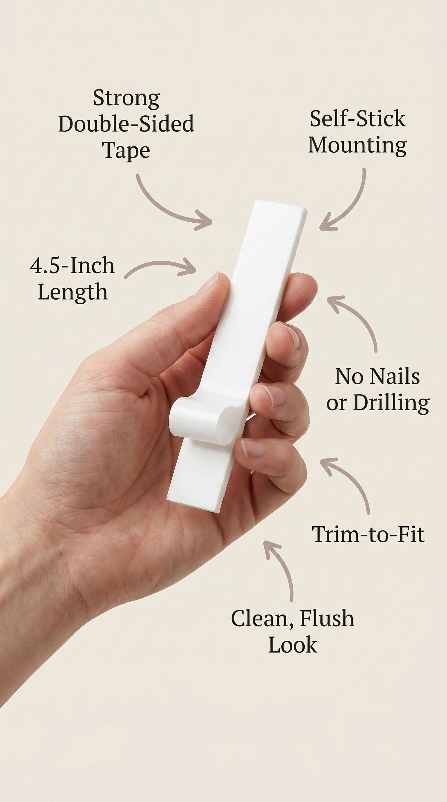 Person holding a 4.5-inch metal mezuzah with a clean, minimalist design and smooth surface, demonstrating handheld display for mounting.