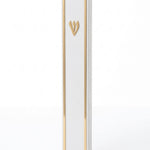 Lumen Gold-Framed White Acrylic Mezuzah shown upright with a narrow gold-toned border around its smooth white face and a matching Hebrew Shin above the midpoint