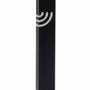 Minimalist Wave black aluminum mezuzah case on a white background with a slim matte-black body and a flowing silver Hebrew Shin