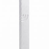 Minimalist Wave silver aluminum mezuzah case on a white background with a slim metallic body and a flowing modern Hebrew Shin