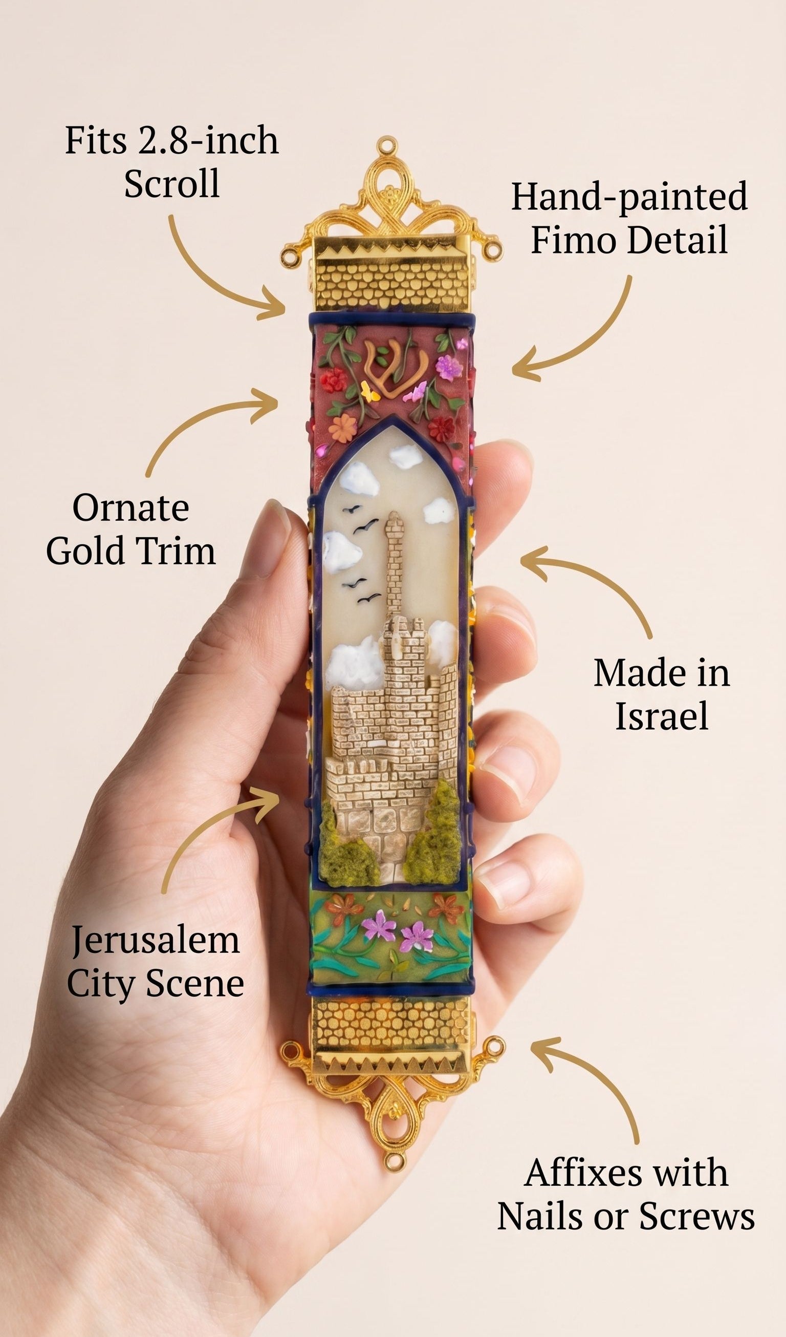 Person holding a decorative mezuzah made of Jerusalem-inspired design with a subtle, minimalist presentation.