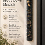Extra large black Birkat HaBayit concrete mezuzah mounted on a front doorpost, showing its 8.5-inch height and raised gold Hebrew details