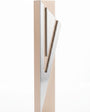 Modern Capital Shin champagne aluminum mezuzah case on white with a tall rectangular body and a large angular silver Hebrew Shin