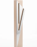 Modern Capital Shin champagne aluminum mezuzah case on white with a tall rectangular body and a large angular silver Hebrew Shin