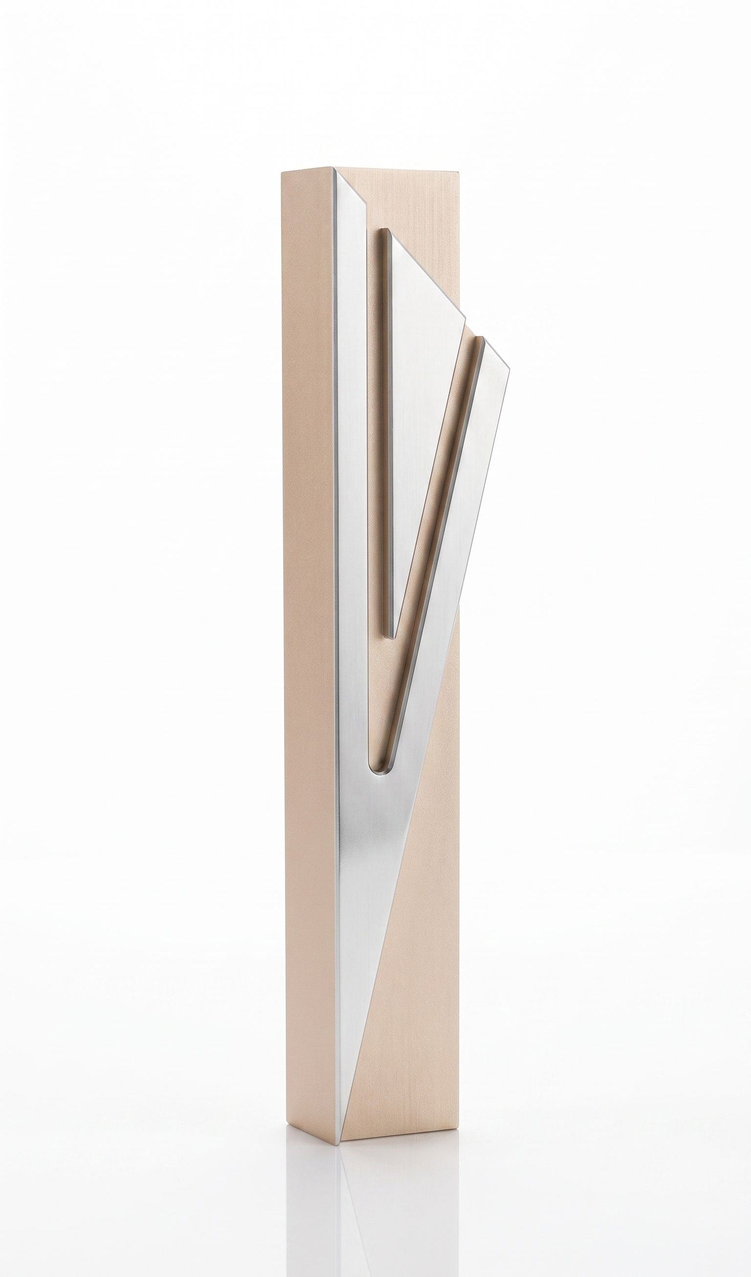 Modern Capital Shin champagne aluminum mezuzah case on white with a tall rectangular body and a large angular silver Hebrew Shin