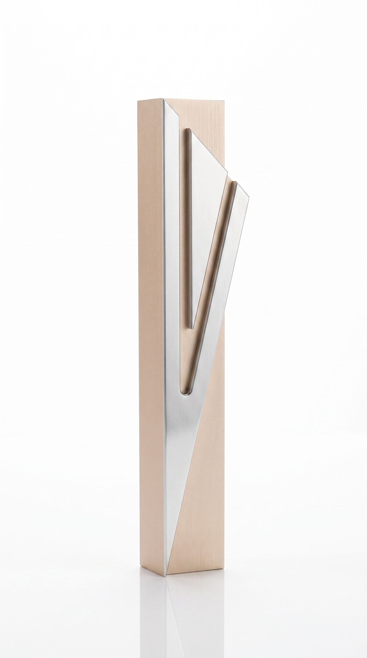 Modern Capital Shin champagne aluminum mezuzah case on white with a tall rectangular body and a large angular silver Hebrew Shin