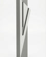 Modern Capital Shin gray aluminum mezuzah case on white with a neutral gray body and a large angular silver Hebrew Shin