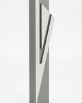 Modern Capital Shin gray aluminum mezuzah case on white with a neutral gray body and a large angular silver Hebrew Shin