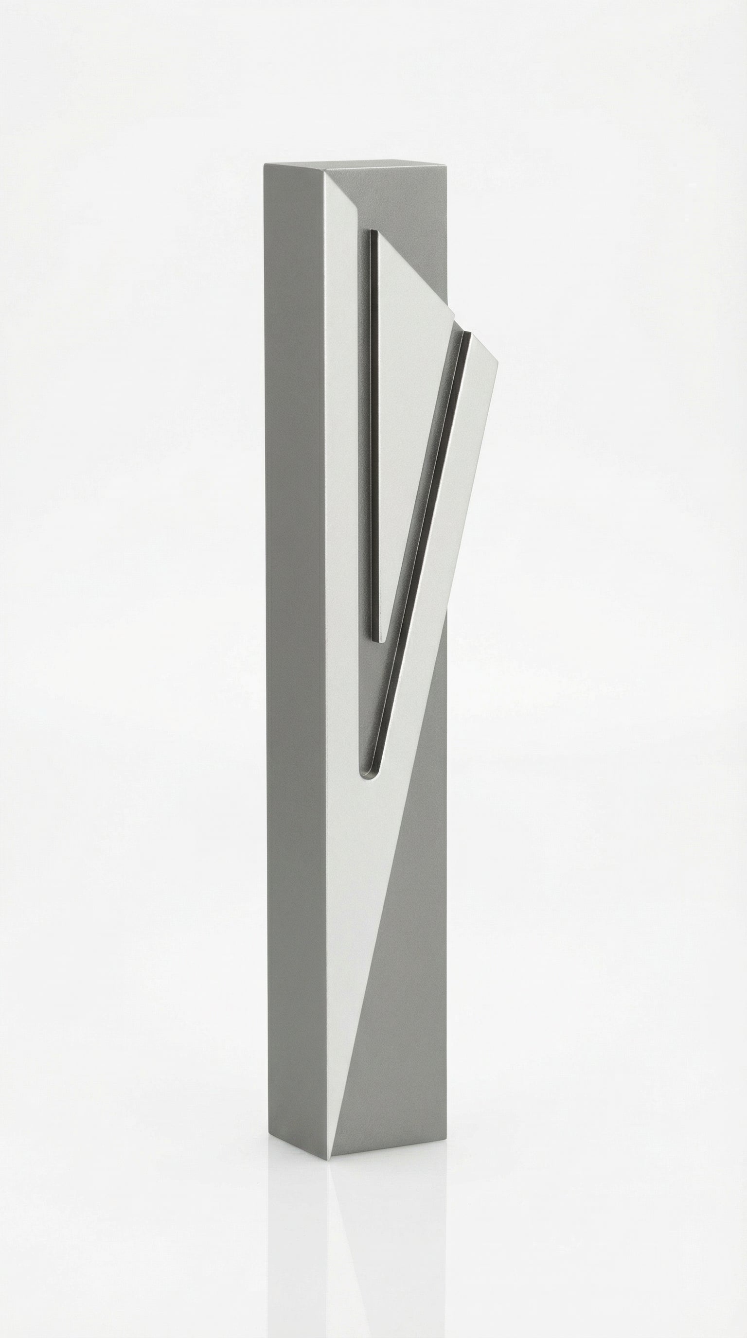 Modern Capital Shin gray aluminum mezuzah case on white with a neutral gray body and a large angular silver Hebrew Shin