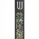 Contemporary cement mezuzah case with colorful stone inlay and Hebrew Shin symbol, suitable for modern interiors with clean design and bright background.