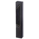 Angled view of the Modern Embossed Gold Shin Black Concrete Mezuzah, a matte black waterproof mezuzah case from Israel with a tall raised Shin outlined in gold, sized for a 5-inch kosher scroll