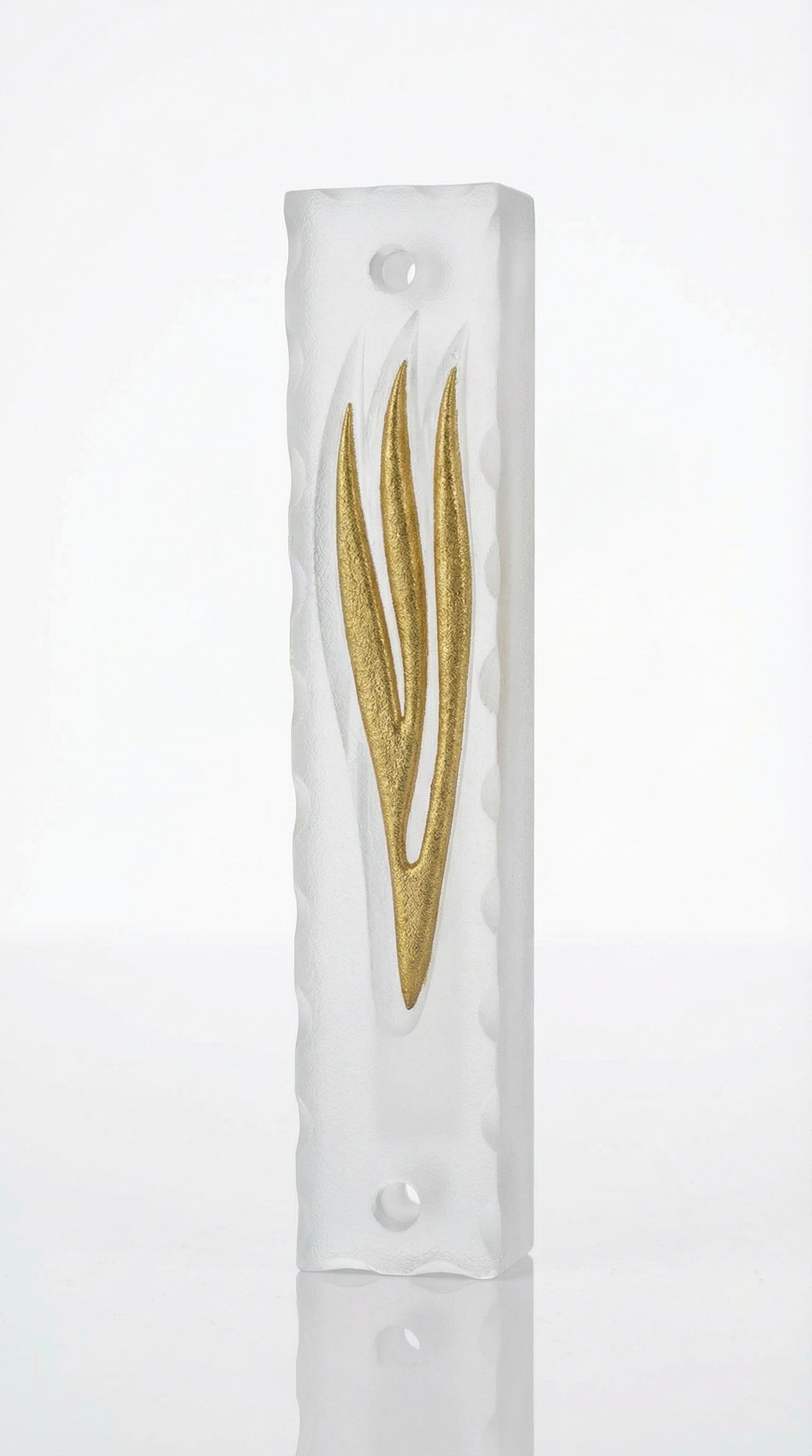 High-resolution image of a modern gold Shin in a frosted glass mezuzah case, shown on a clean white background with subtle reflection.
