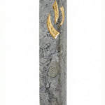 Detailed view of a handcrafted Jerusalem stone Mezuzah in gray, with intricate Hebrew engravings, on a clean white studio background with soft reflection.