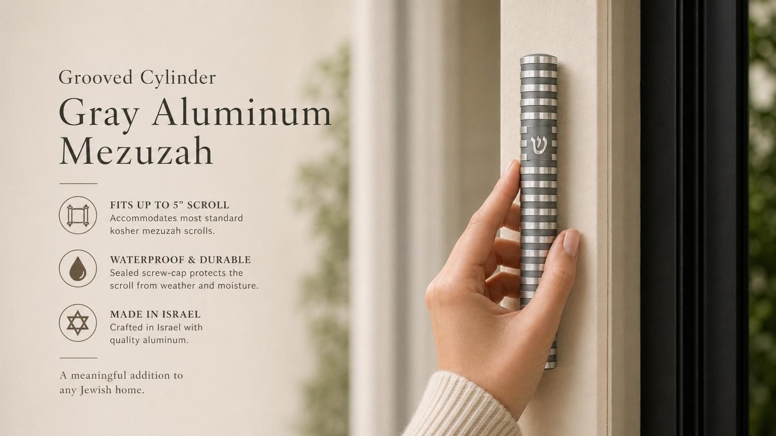 Person holding a gray aluminum mezuzah with polished silver grooves and Hebrew Shin, on a stylish, balanced background with editorial text.