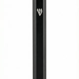 Sleek black aluminum outdoor mezuzah case with engraved Shin, designed for exterior doorways, with a secure screw-in cap and minimalist style.