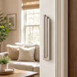 Indoor lifestyle shot of exact sandstone pyramid mezuzah mounted on a residential doorpost.