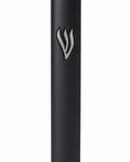 Matte black cement mezuzah case with a raised sculptural silver Shin centered near the upper front