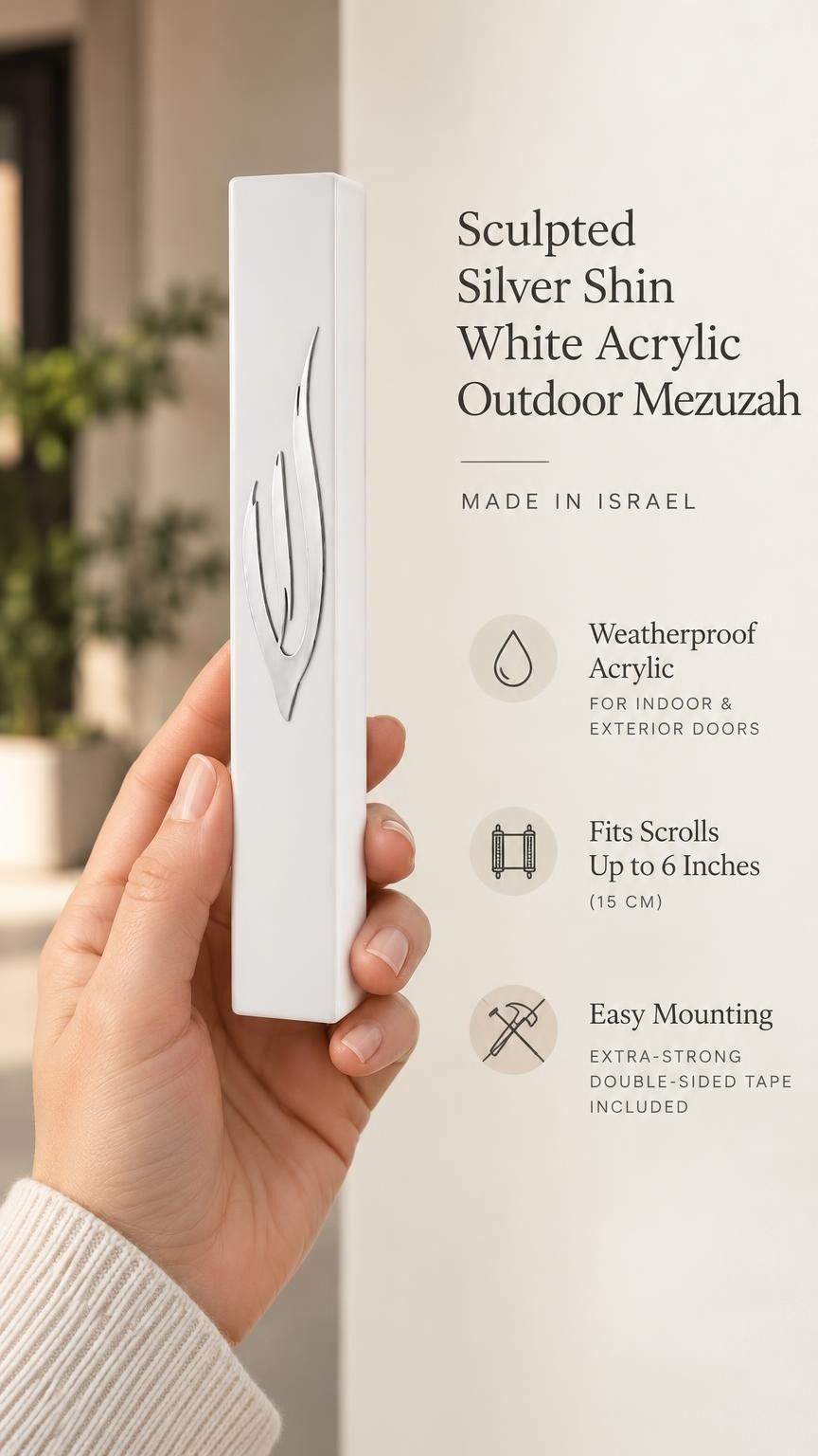 Close-up of the sculpted silver Shin with a polished finish on the smooth white acrylic face of the waterproof seven-inch Israeli mezuzah case for modern door frames