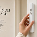 White aluminum mezuzah with eternal flame emblem, modern vertical design, fits kosher scroll, suitable for contemporary Jewish entrances.