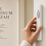 White aluminum mezuzah with eternal flame emblem, modern vertical design, fits kosher scroll, suitable for contemporary Jewish entrances.
