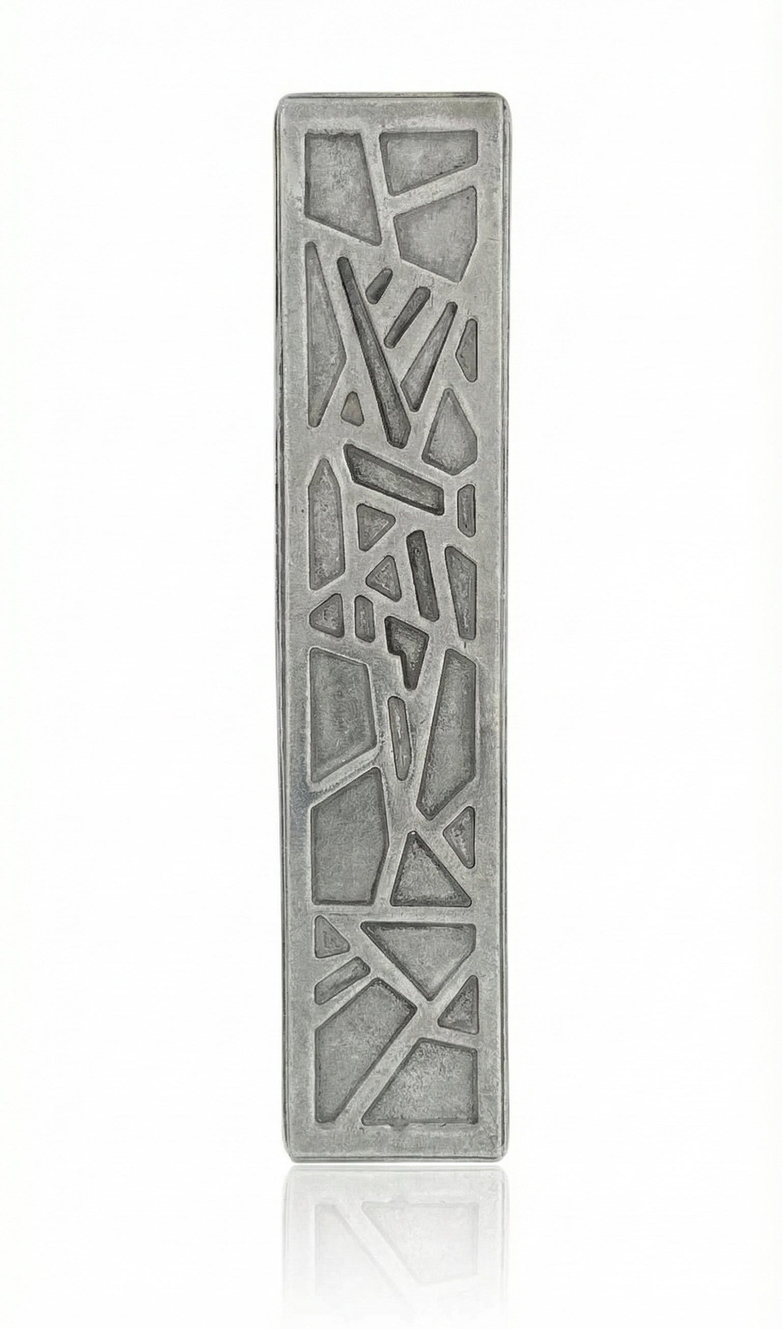 High-resolution image of an intricately designed mosaic pewter mezuzah from Israel, showcasing detailed engravings and a polished surface, on a white studio background with subtle reflection.