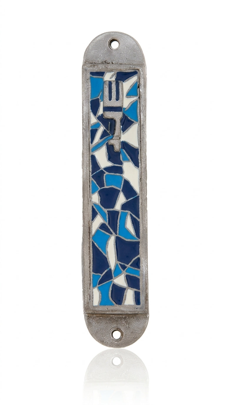 Detailed mosaic pewter mezuzah with Hebrew engravings, designed for doorpost decoration, with a polished white studio background and subtle reflection.