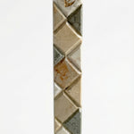 Large Jerusalem stone mosaic mezuzah with Hebrew engravings, decorative motifs, and reflection on white studio background.