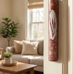 a 7-inch pink color Rose Veiled Shin natural marble mezuzah case made in Israel with scroll-fit and doorway-use details mounted on a interior residential doorway