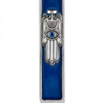 High-resolution image of the Mystic Mezuzah showcasing its detailed design, multi-layered symbolism, and polished surface on a white studio background with a soft reflection.