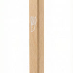 Elegant natural white oak wood mezuzah made in Israel with detailed Hebrew engravings, designed for doorposts in home and religious settings.